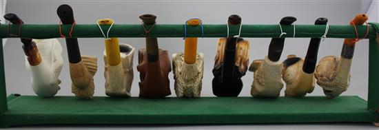 A collection of Meerschaum pipes and cheroot holders,